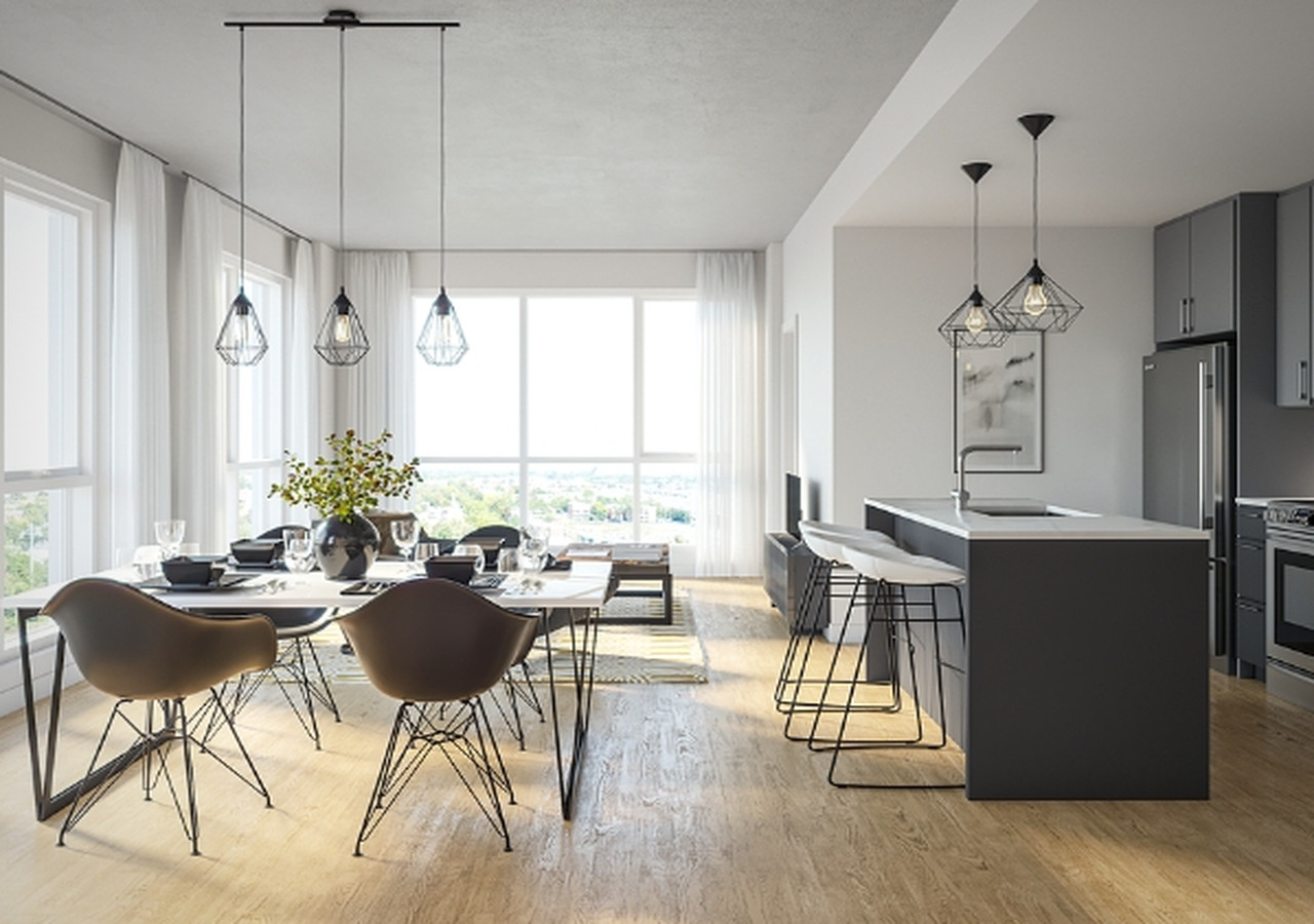 Dining room and kitchen with large windows